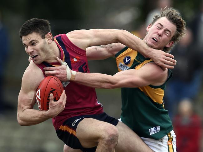 VAFA Footy: Old Scotch v Old Trinity at Camberwell Oval. Evgeni Routman and Ed Weatherson.