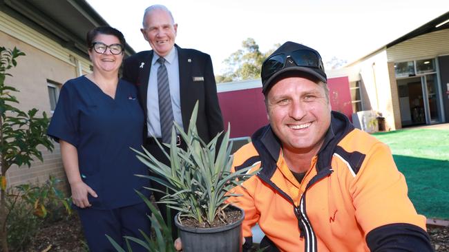 L-R Mt Druitt Hospital, Palliative Care Nursing Unit Manager Trish Dalgleish, Blacktown Workers Club Welfare Officer Harold Becker and Blacktown Workers Club Groundsmen Geoff Cooke in the Palliative care ward garden created for DoSomething Day 2018. Mount Druitt, Wednesday, July 25th 2018. Blacktown Workers Club members have been upgrading the entrance at Mt Druitt Hospital palliative care ward. (AAP Image / Angelo Velardo)