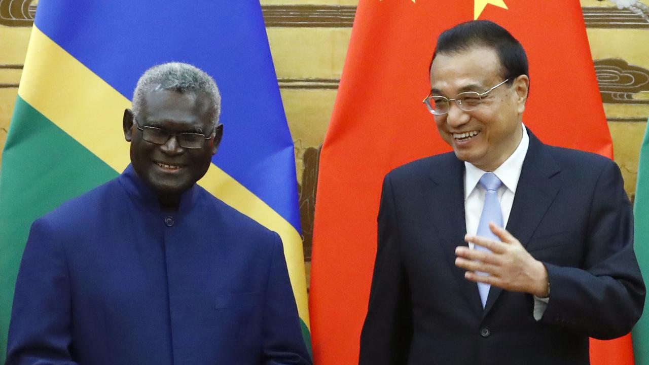 Solomon Islands Prime Minister Manasseh Sogavare and Chinese Premier Li Keqiang in 2019. Photo: Thomas Peter-Pool / Getty Images