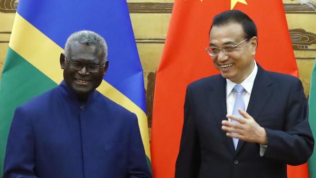 Solomon Islands Prime Minister Manasseh Sogavare and Chinese Premier Li Keqiang in 2019. Photo: Thomas Peter-Pool / Getty Images