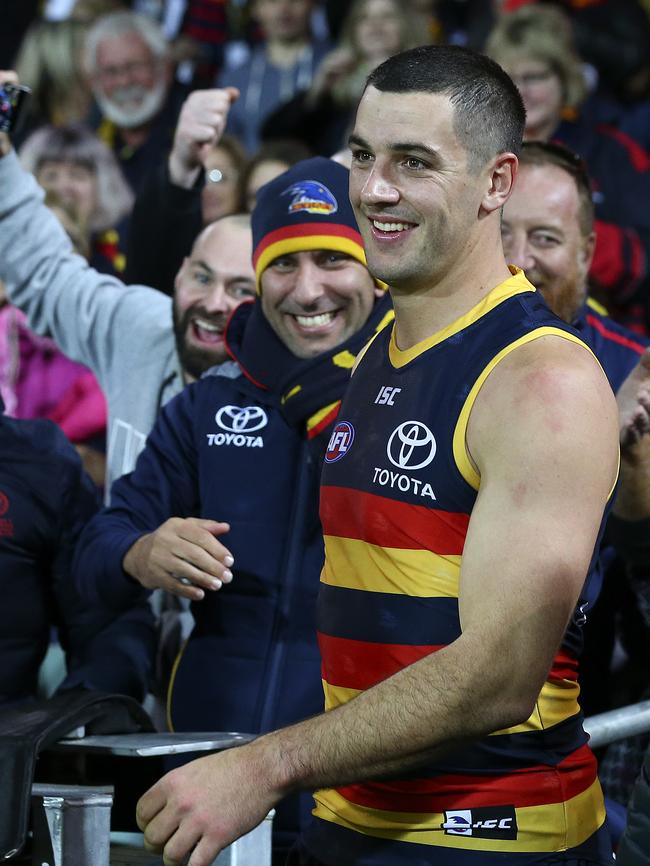 Taylor Walker has a laugh with the crowd after the win. Picture Sarah Reed