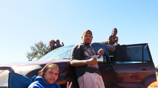 Spectators have gathered to watch competitors tackle day one of the 2024 Tatts Finke Desert Race.