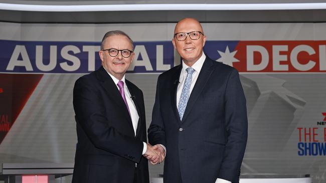 Anthony Albanese shakes hands with Opposition Leader Peter Dutton during the fourth and final leaders' debate. Picture: Dan Peled/Getty Images