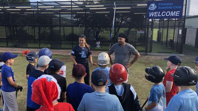 Manny Ramirez and New York Yankees hitting coach Rachel Balkovec get to know some of the local juniors before the clinic begins. Picture: Jim O'Rourke