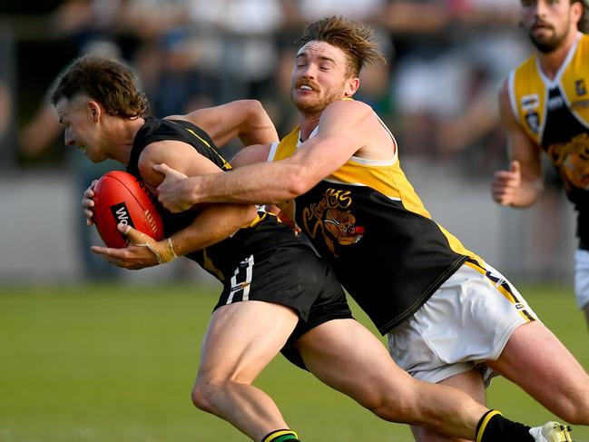 Jake Aarts of the Tigers is tackled by Brenton Lambert of the Stonecats during the 2023 MPFNL Division One Seniors Grand Final match between Dromana and Frankston YCW at Frankston Park in Frankston, Victoria on September 17, 2023. (Photo by Josh Chadwick)