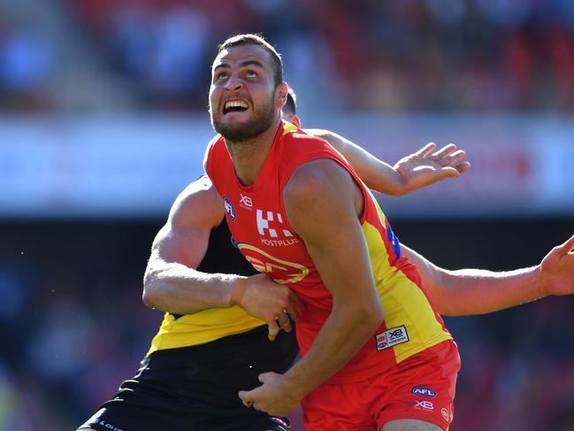 Jarrod Witts of the Suns in action during the Round 21 AFL match between the Gold Coast Suns and the Richmond Tigers at Metricon Stadium on the Gold Coast, Saturday, August 11, 2018. Picture: AAP Image/Darren England.