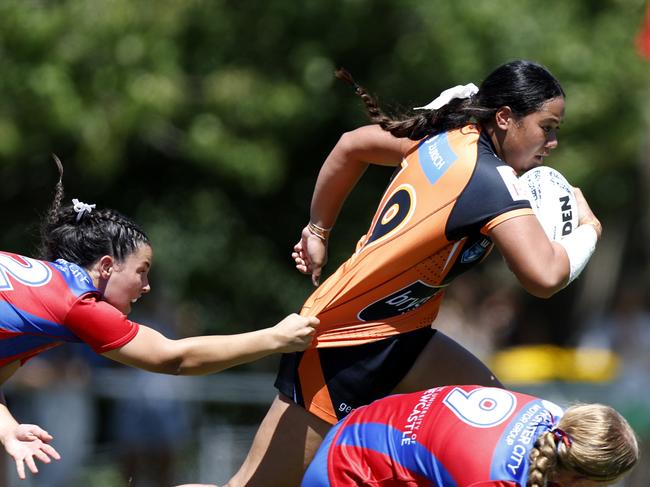 Faith Masina crossed for an important try in the Wests Tigers’ narrow victory over Newcastle in the Lisa Fiaola Cup. Picture: Michael Gorton