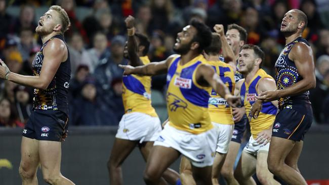 Hugh Greenwood and Cameron Ellis-Yolmen watch as another Eagles goal goes through in the third term. Picture SARAH REED