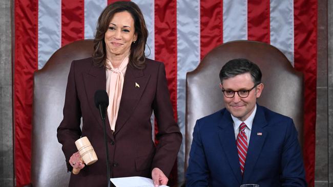 The Vice President Kamala Harris announces that the votes are certified as Speaker of the House Mike Johnson looks on during of a joint session of Congress to certify the results of the 2024 Presidential election which Donald Trump won. (Photo by SAUL LOEB / AFP)