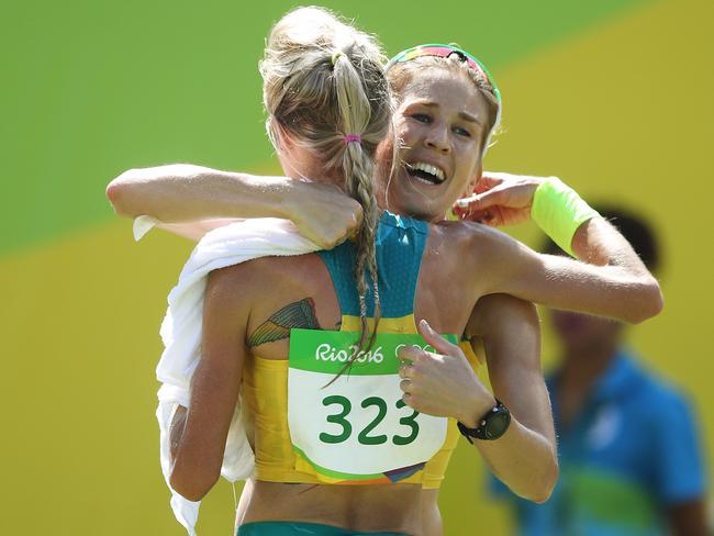 Australia's Jessica Trengove and Milly Clark embrace after the Women's Marathon Final at the Rio 2016 Olympic Games. Picture. Brett Costello