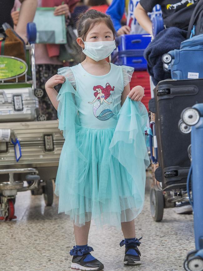 Tina Wang in her mask and Little Mermaid dress. Picture: Rob Leeson