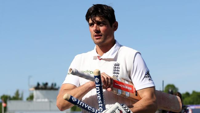 England's captain Alastair Cook leaves the field after his team beat Sri Lanka.