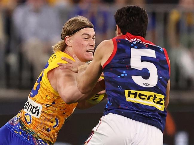 Harley Reid fends off Christian Petracca. (Photo by Paul Kane/Getty Images)