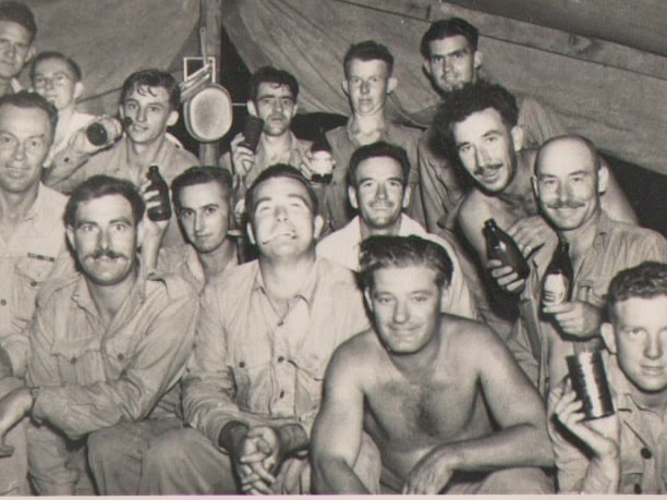 “My dad Michael Ryan (can of beer in his hands) and his brother Peter Ryan from WWII, both in the Air Force, having a beer with mates.” Picture: Supplied by Rosalyn Tuzzolino