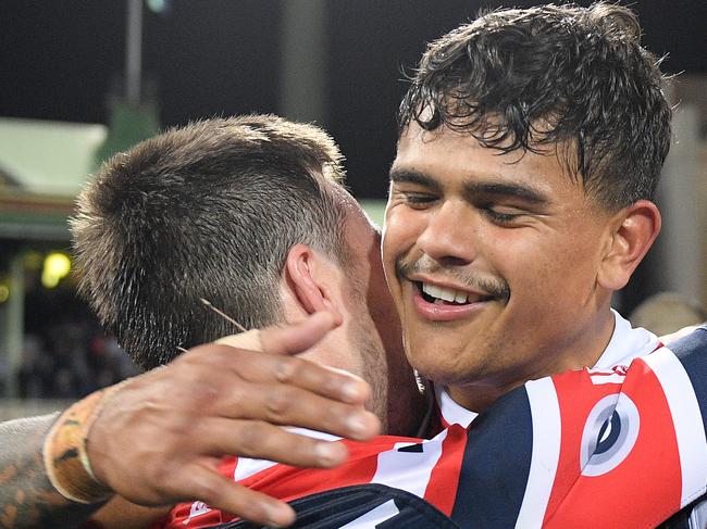 Latrell Mitchell and Luke Keary celebrate following their  win over the Storm in the NRL Preliminary Final match between the Sydney Roosters and Melbourne Storm at the SCG in Sydney, Saturday, September 28, 2019. (AAP Image/Dan Himbrechts) NO ARCHIVING, EDITORIAL USE ONLY