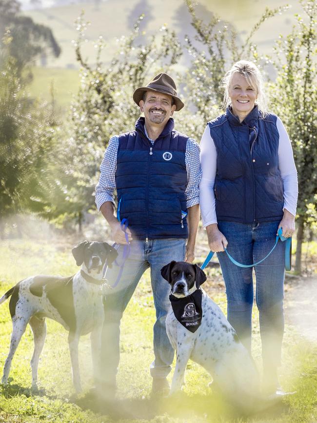 Michelle and Ron with their dogs Charlie and Boogie.