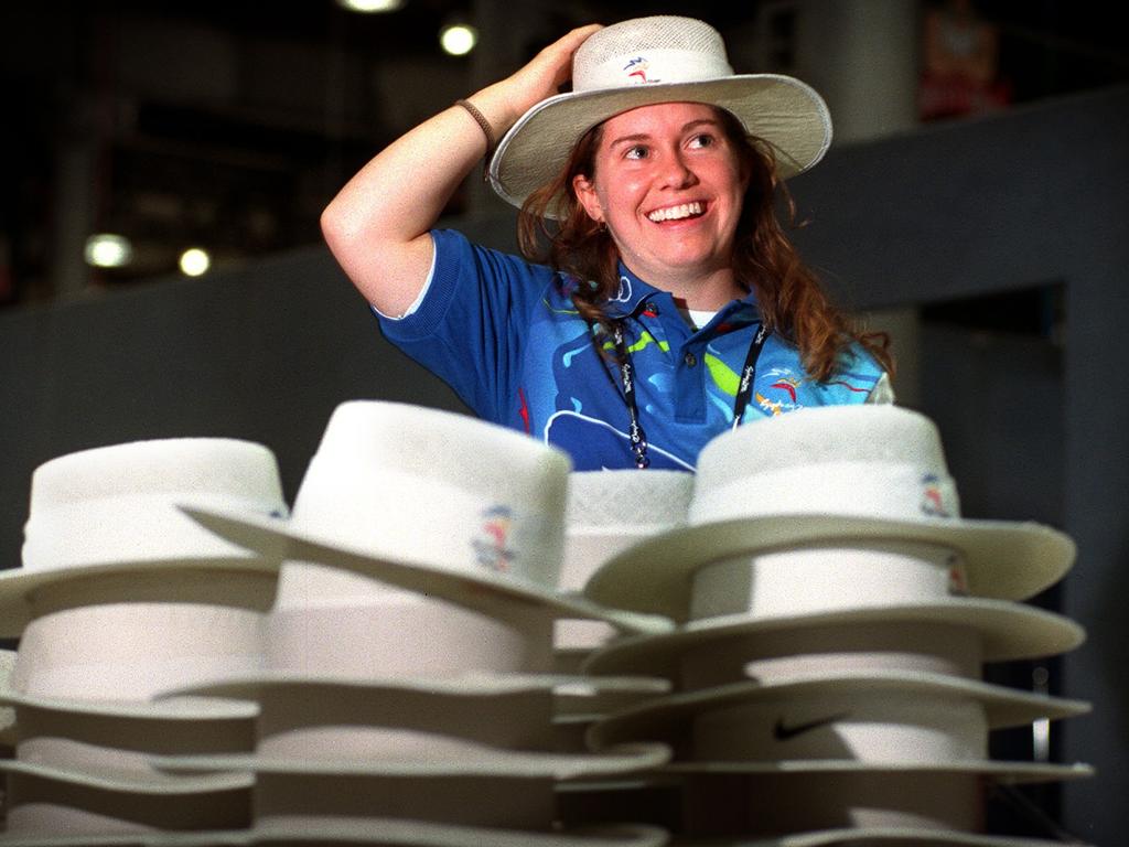 Olympic volunteer Sara Webster checks sun hats for the 2000 Sydney Games. Picture: Alan Pryke