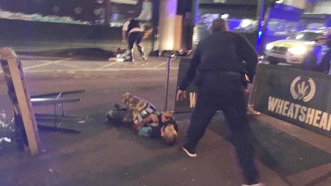 A man lies on the ground after being shot by police outside the Wheatsheaf pub near London Bridge. Picture: BBC2