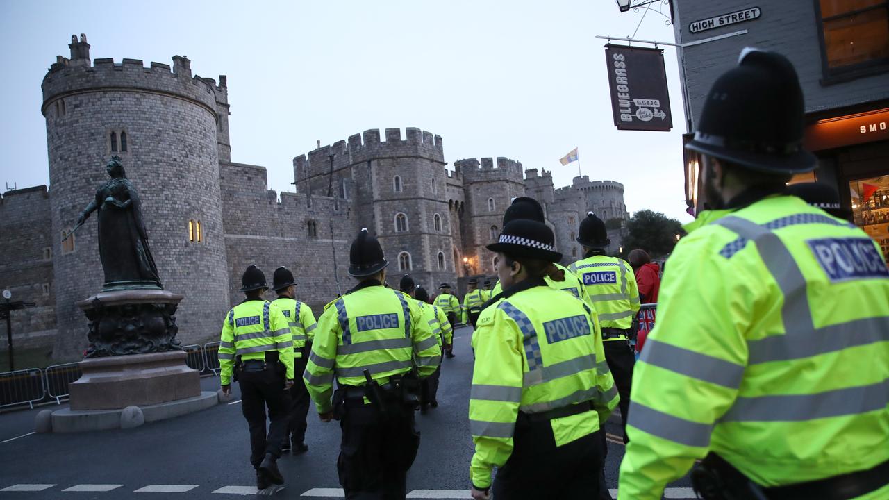 Police officers make their way past Windsor Castle. Picture: Getty Images