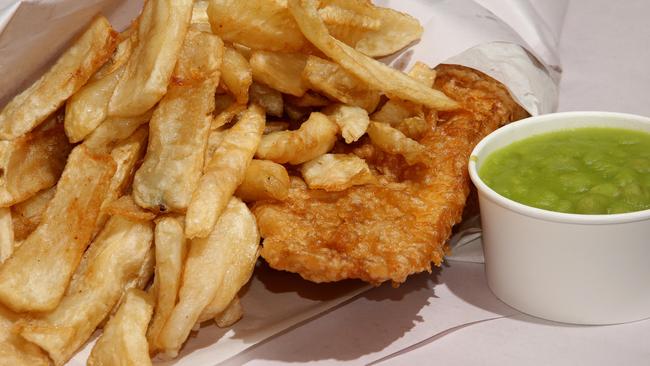 The Great British Fryer’s Battered North Atlantic salmon with mushy peas direct from the UK and home cut chips. Picture by Scott Fletcher