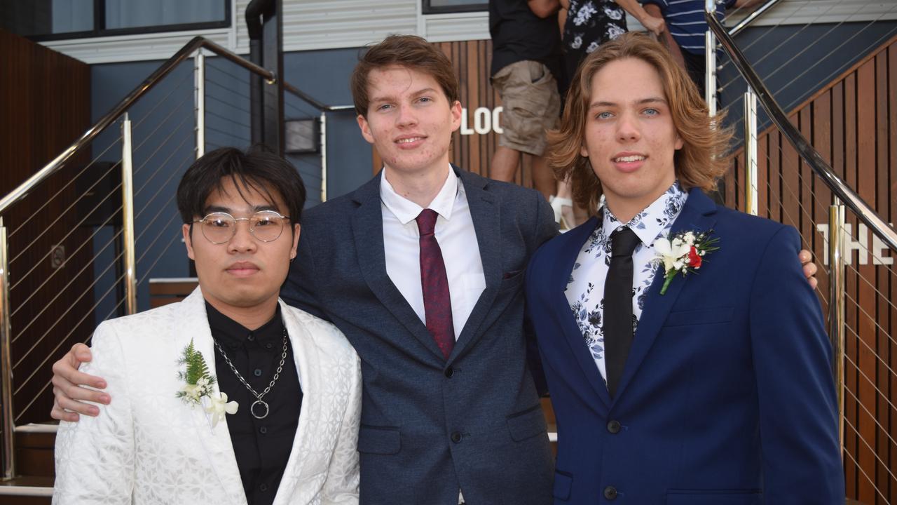 (From left) Ben Li, Jayden Hobbs and Caleb van Dalen at the 2020 St Catherine's Catholic College formal. Photo: Elyse Wurm