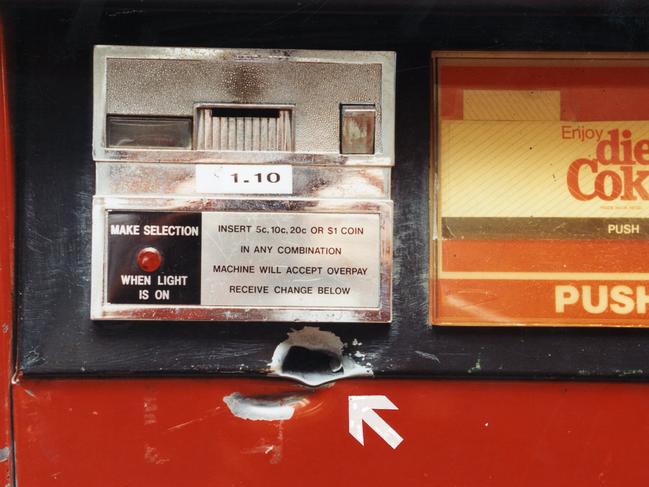 Presented without comment ... a bullet hole in a Coke vending machine on the ground floor at Holden Hill Police Station, 1994.