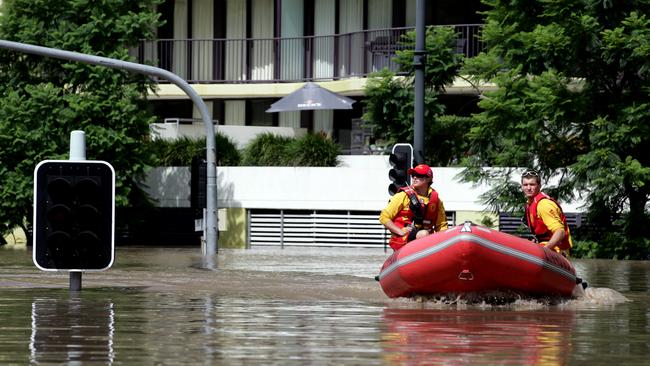Surf Life Savers on patrol in Land St, Toowong.