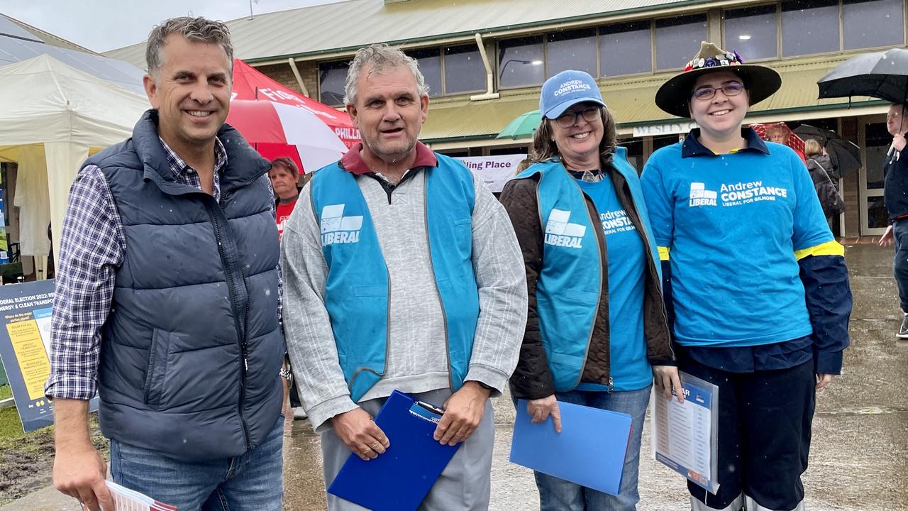 Gilmore Liberal candidate Andrew Constance (left) at a pre-poll centre in Nowra. Picture: Dylan Arvela