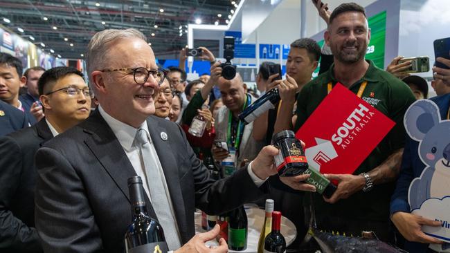 Anthony Albanese was mobbed by Chinese media and store owners on a walkabout of the Australian pavilion at the China International Import Expo trade show. Picture: PMO/X