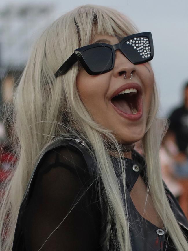 A fan waits for the start of Lady Gaga's free concert on Copacabana beach in Rio de Janeiro. Picture: AP Photo/Bruna Prado