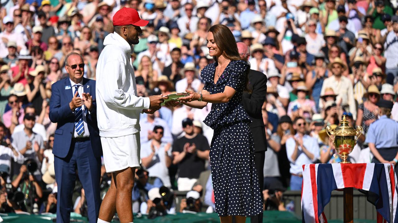 As is custom, the Duchess of Cambridge presented both players with their silverware. (Photo by SEBASTIEN BOZON / AFP)