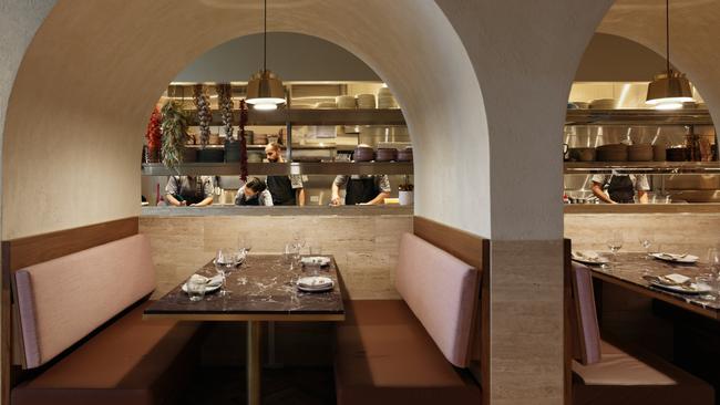 The open kitchen and arched booths at Babylon Brisbane in the CBD.