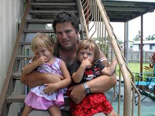 Sole parent Derek Fenech, with his daughters Amelio, 2, and Katherine, 1, is desperate to find a home for his family of four in Mackay. Picture: Kieran Moran