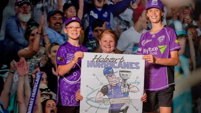 Hurricanes Fans Maverick Appleton, 11, Ellie Appleton, 8, and Flynn Beattie, 13, with the special edition Hurricanes poster at Ninja Stadium.Picture: Linda Higginson