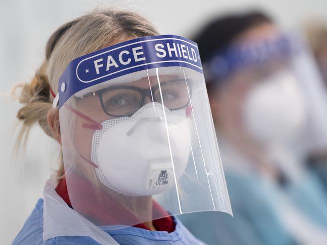 Medical staff receive training on how to put on and remove PPE in northern England. Picture: AP