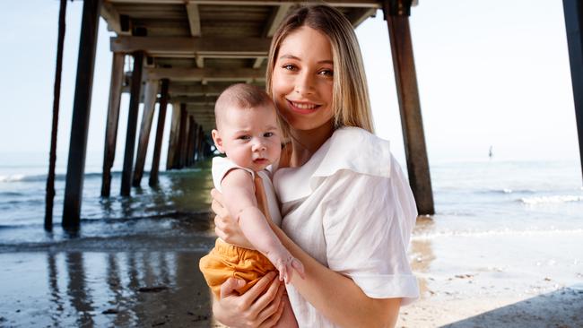 Simona (Simi) Beric with her 3.5 month old son Lincoln enjoying Adelaide’s warm burst of weather this week. Picture: Matt Turner