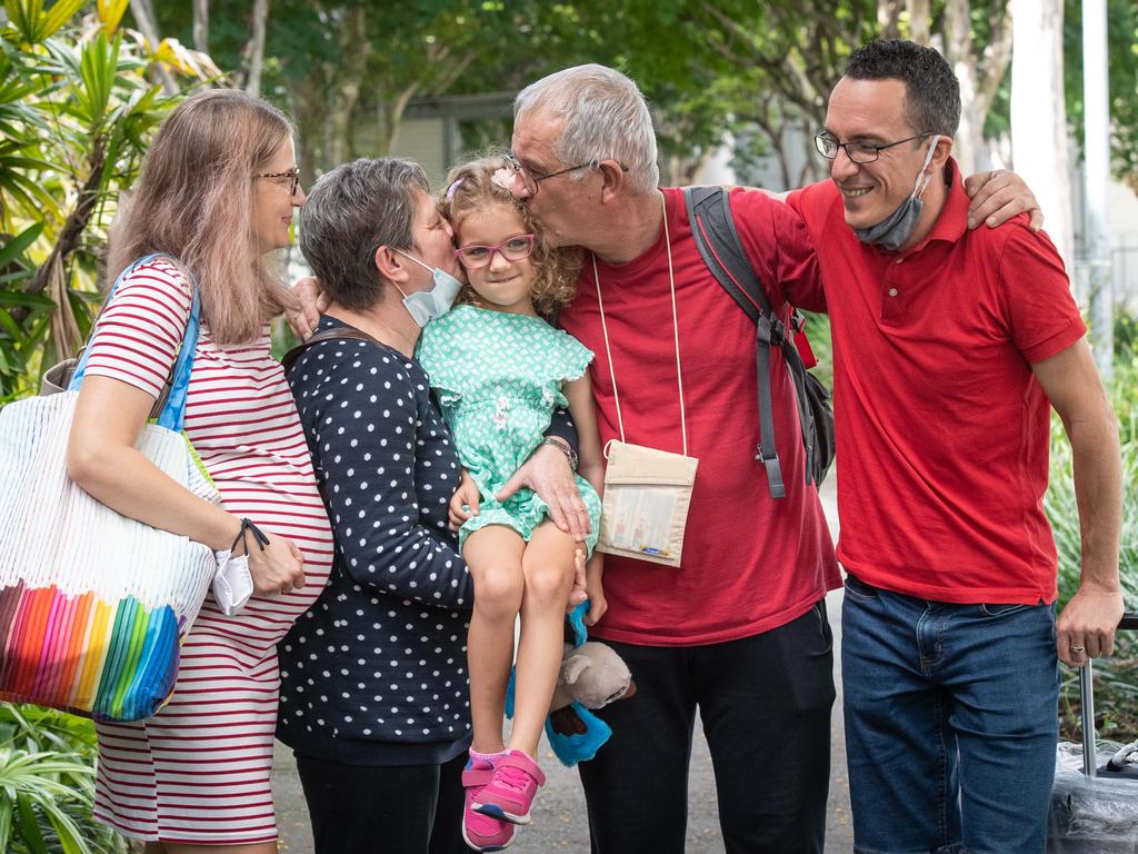 Zsofi Nemeth, Julianna Nemeth, Lili Kaity, 5, Rudolf Nemeth and David Kaity at Brisbane International airport as borders re-open. Picture: Brad Fleet