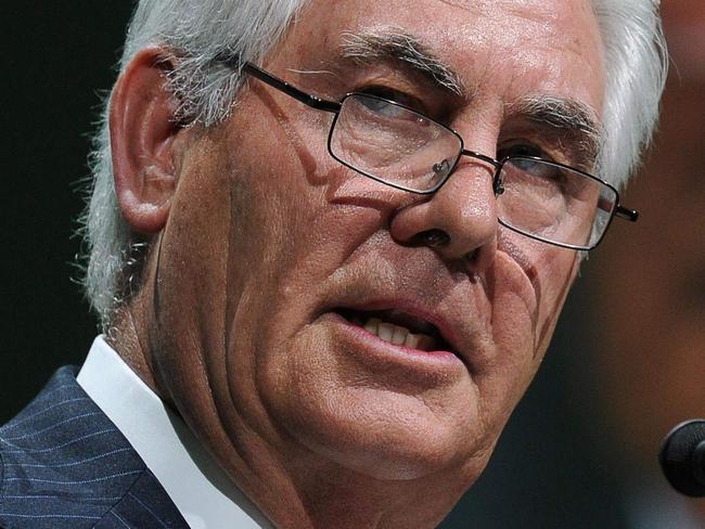 (FILES) This file photo taken on June 2, 2015 shows Exxon Mobil Chairman and CEO Rex Tillerson addressing the World Gas Conference in Paris. President-elect Donald Trump on Tuesday tapped ExxonMobil chief Rex Tillerson, an oilman with deep ties to Russia, as his secretary of state. Tillerson's nomination comes just days after a secret CIA report accused Russia of interfering with the US election in favor of Trump, in a development which could complicate his confirmation. / AFP PHOTO / ERIC PIERMONT