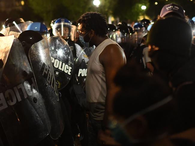 Protesters face off with police outside the White House in Washington, DC. Picture: AFP