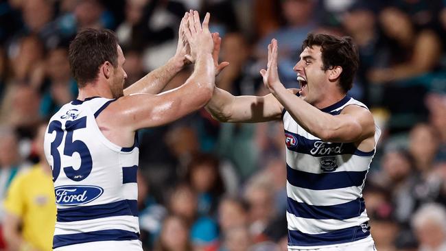 Patrick Dangerfield and Shaun Mannagh celebrate a goal. Picture: Michael Willson/AFL Photos via Getty Images