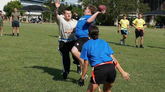 Darwin Middle School students playing Flag Football against United States Marines at DMS, 19 May 2025. Picture: Jason McIntosh