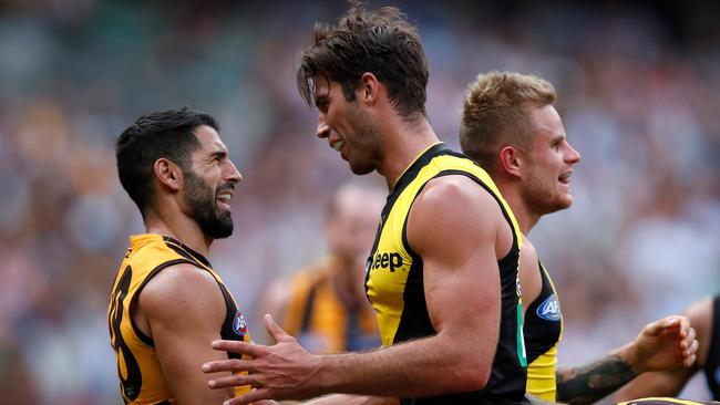 Paul Puopolo remonstrates with Alex Rance. Pic: Getty Images