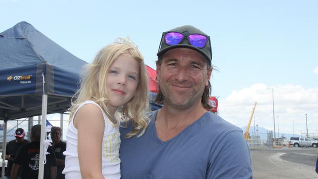 Chad Wilson, 44, said he was there with daughter Sage, 4, to support workers protesting the tugboat worker lockout as a ban on cruise ships would hurt their Cairns CBD boutique. Picture: Alison Paterson
