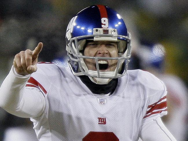 New York Giants kicker Lawrence Tynes (9) reacts after making the game-winning field goal in overtime during the NFC Championship football game against the Green Bay Packers Sunday, Jan. 20, 2008, in Green Bay, Wis. The Giants won 23-20. (AP Photo/David J. Phillip)