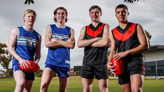 Sacred Heart’s Beau McRae and Will Day with Rostrevor’s Cameron Taheny and Stefan Lanzoni. Picture: MATT TURNER.