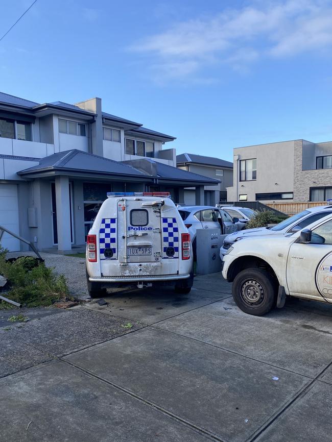 A police car boxes in the family’s car. Picture: Owen Leonard