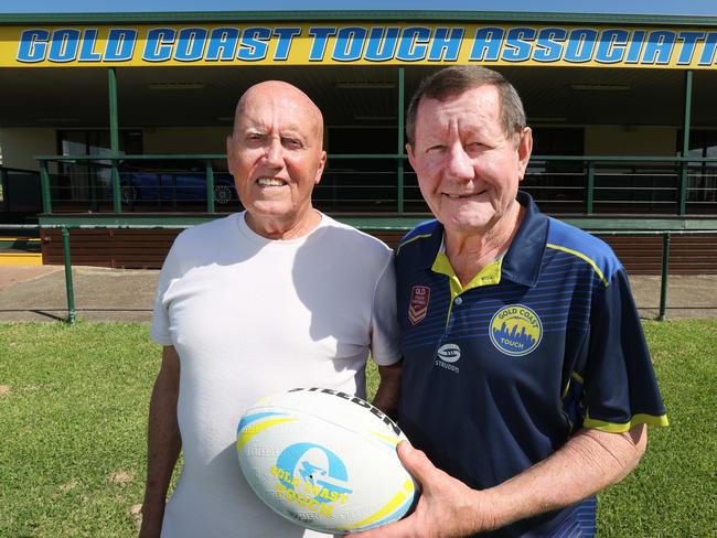 Gold Coast Touch Football stalwarts Henry Lesniewski and Paul Eggers( white) remember fifty years of the sport at Owen Park Southport. Picture Glenn Hampson