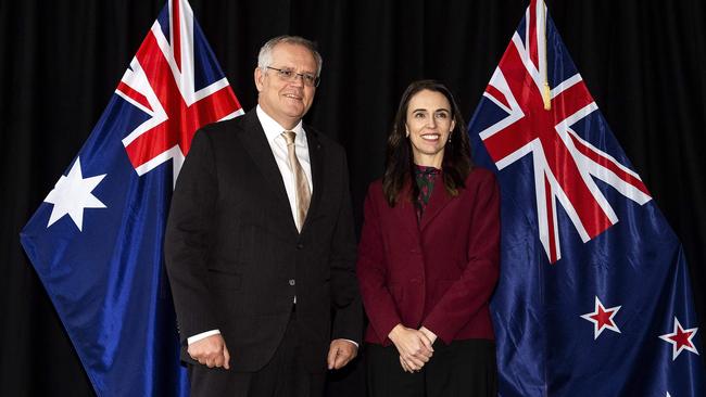 New Zealand’s Prime Minister Jacinda Ardern (R) poses for a photo with Australia's Prime Minister Scott Morrison ahead of their annual talks in Queenstown in May 31.