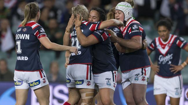 Roosters players celebrate their win over the Dragons to reach the NRLW grand final. Picture: AAP