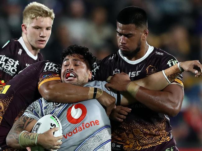 AUCKLAND, NEW ZEALAND - MAY 25: Patrick Herbert of the Warriors is brought down during the round 11 NRL match between the New Zealand Warriors and the Brisbane Broncos at Mt Smart Stadium on May 25, 2019 in Auckland, New Zealand. (Photo by Hannah Peters/Getty Images)